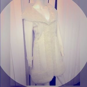 White faux fur BEBE coat. Mint condition. Stunning and very warm!